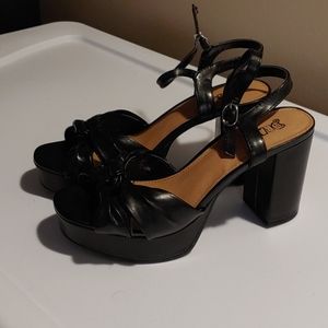 Brash Black Strappy Platform Heels